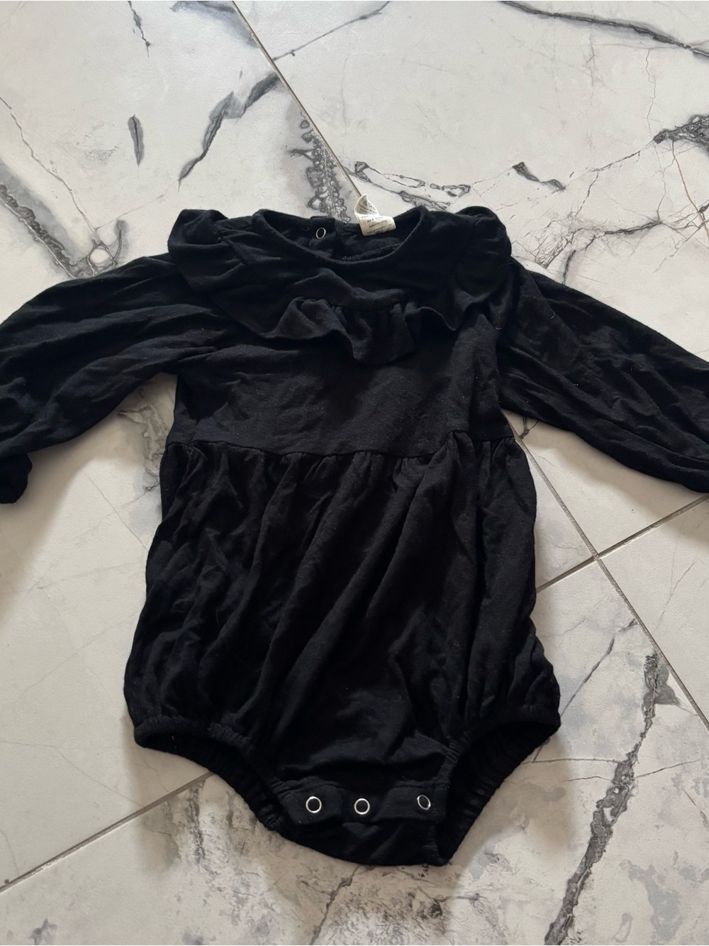 Quinn Black Long-Sleeve Ruffle One-Piece Bodysuit